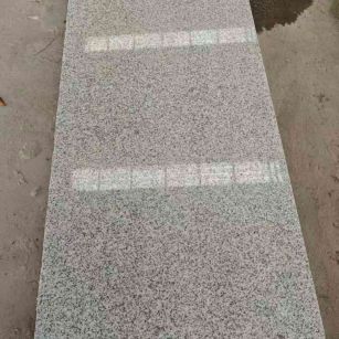 宜昌芝麻白光面毛板